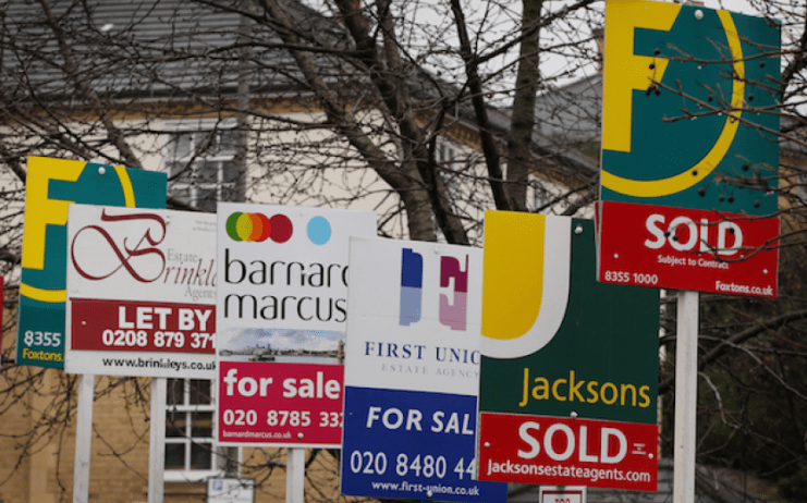 House prices inched down in February as activity slowed but remain more than five per cent up year-on-year, new data released today showed.