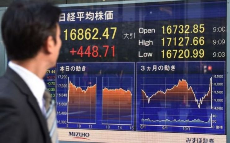 Asian stocks climb as China manufacturing PMI beats expectations