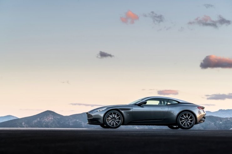 Aston Martin swings to &pound;13.5m loss