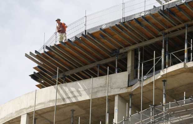 THe UK&rsquo;s biggest housebuilder Barratt Developments today scrapped a special dividend payout as it reported a 45 per cent drop in pre-tax profit.