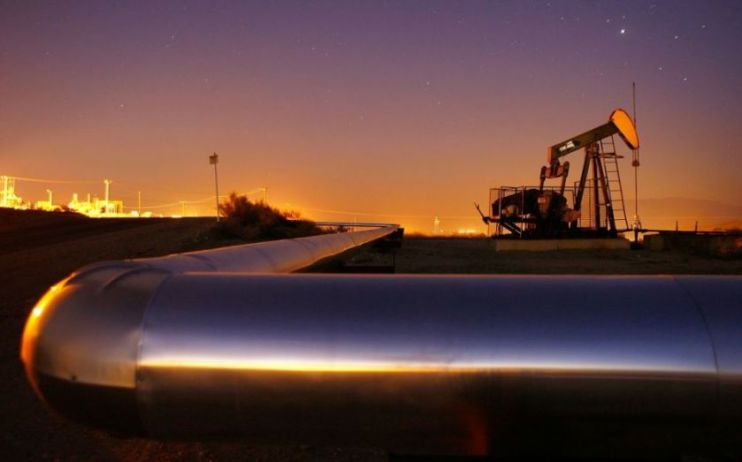 Oil giant Saudi Aramco has agreed a $12.4bn (&pound;9bn) deal to sell nearly half of its pipelines business to a consortium led by private equity firm EIG Global Energy Partners.
