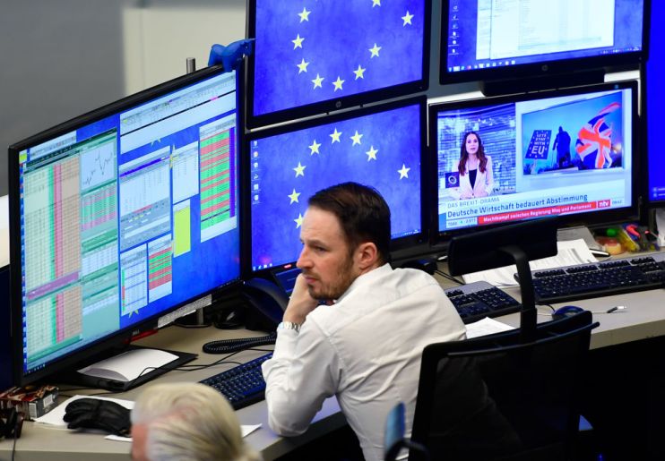 A trader at the Frankfurt Stock Exchange in Germany weighs up the state of the Eurozone economy