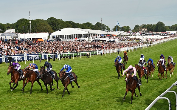 Jockey Seamie Heffernan rides Anthony Van Dyck (R) to victory in the Derby Stakes on the second day of the Epsom Derby Festival in Surrey, southern England on June 1, 2019. - Anthony van Dyck gave trainer Aidan O'Brien a record-equalling seventh winner in the Epsom Derby on Saturday. The 49-year-old Irishman had seven runners in this year's edition of English flat racing's premier event (Photo by Glyn KIRK / AFP) (Photo credit should read GLYN KIRK/AFP/Getty Images)