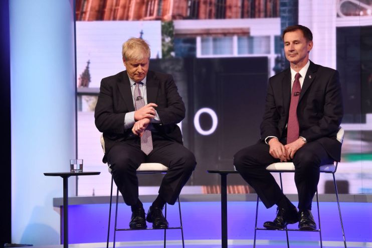 LONDON, ENGLAND - JUNE 18: In this handout photo provided by the BBC, (L-R) MP Boris Johnson and Secretary of State for Foreign Affairs Jeremy Hunt participate in a Conservative Leadership televised debate on June 18, 2019 in London, England. Emily Maitlis hosts the second of the televised Conservative Leadership debates for the BBC. Boris Johnson, Michael Gove, Jeremy Hunt, Rory Stewart and Sajid Javid made it through the second ballot while Dominic Raab did not. The third ballot will be held tomorrow, (Wednesday). (Photo by Jeff Overs/BBC via Getty Images)