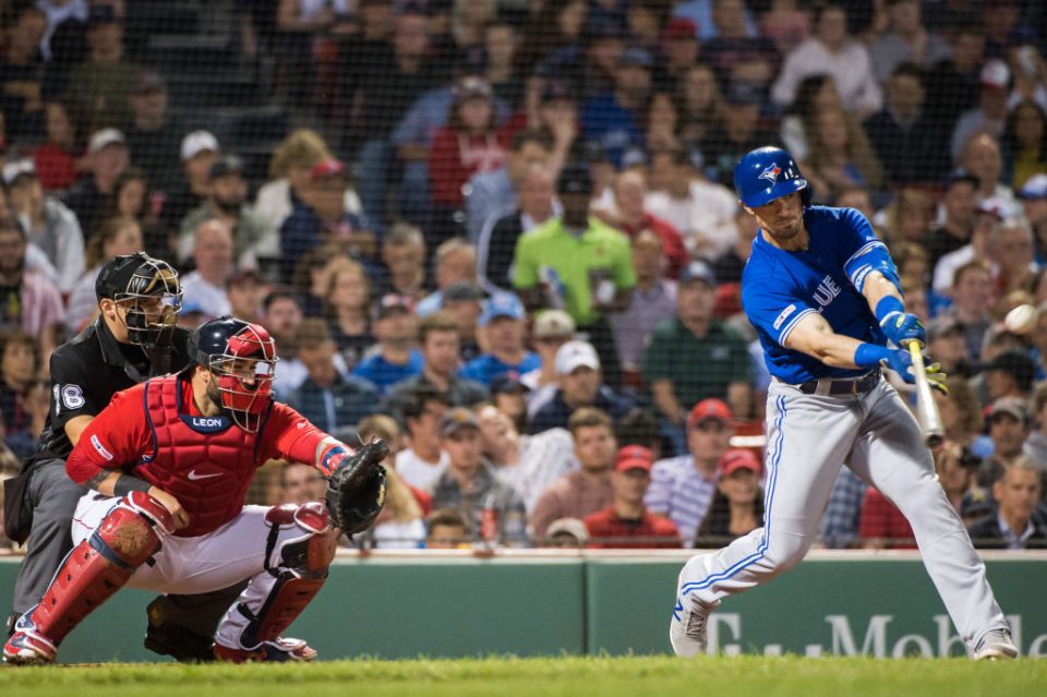 BOSTON, MA - JUNE 21: Randal Grichuk #15 of the Toronto Blue Jays hits a RBI single in the seventh inning against the Boston Red Sox at Fenway Park on June 21, 2019 in Boston, Massachusetts. (Photo by Kathryn Riley /Getty Images)