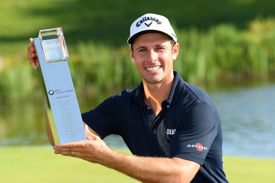 MUNICH, GERMANY - JUNE 23: Andrea Pavan of Italy poses with the trophy after his victory during a playoff during day four of the BMW International Open at Golfclub Munchen Eichenried on June 23, 2019 in Munich, Germany. (Photo by Stuart Franklin/Getty Images)