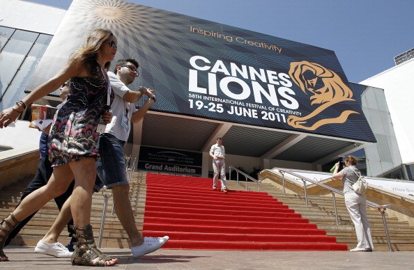 People walk on June 21, 2011 in front of the Palais des Festivals where take place the 58th edition of the International festival of creativity, Cannes Lions on June 21 2011, in Cannes on French riviera. AFP PHOTO / SEBASTIEN NOGIER (Photo credit should read SEBASTIEN NOGIER/AFP/Getty Images)