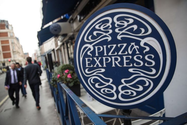 LONDON, ENGLAND - FEBRUARY 16: People walk by a Pizza Express restaurant in Marylebone on February 16, 2017 in London, England. The Association for Licensed Multiple Retailers have written to the Chancellor Philip Hammond calling for more transitional relief ahead of a business rate increase in April. A further rise in business rates could force more pubs and restaurants across the UK to close as they struggle to keep up with costs. (Photo by Jack Taylor/Getty Images)
