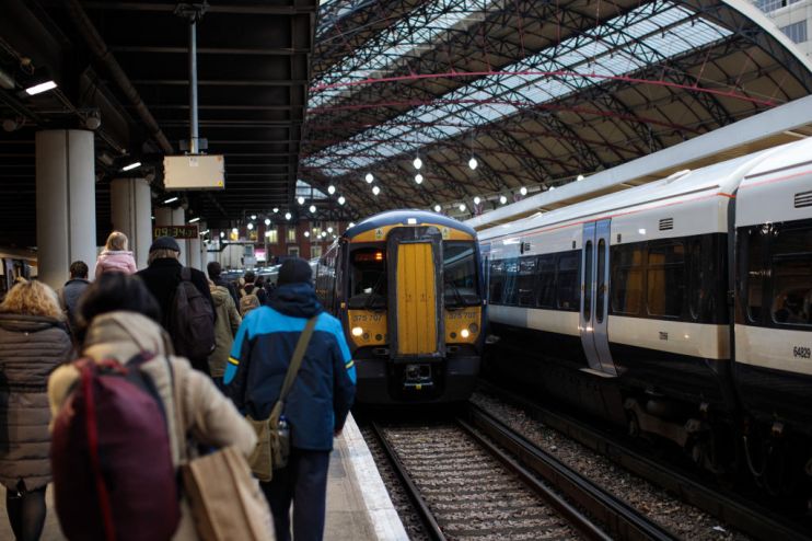 LONDON, ENGLAND - JANUARY 02: Commuters leave the platform at Victoria Station on January 2, 2018 in London, England. The average cost of a rail ticket has risen by 3.4% today, the biggest increase since 2013. (Photo by Jack Taylor/Getty Images)