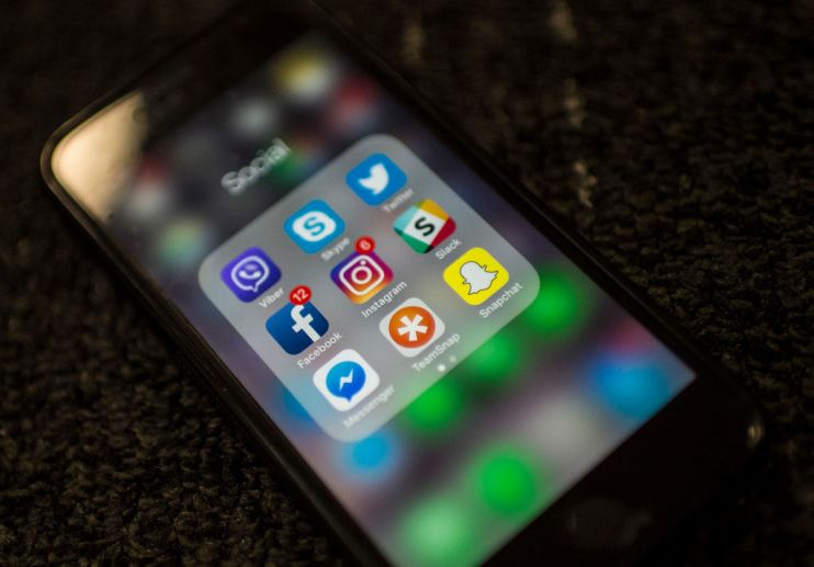 Social Network applications including Facebook, Instagram, Slack, Snapchat, Twitter, Skype, Viber , Teamsnap and Messenger, are on display on a smartphone on March 21, 2018 in Washington DC. (Photo by Eric BARADAT / AFP) (Photo credit should read ERIC BARADAT/AFP/Getty Images)