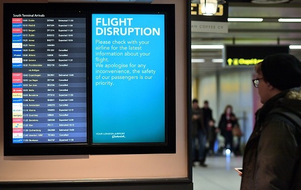 An information board displays flight information follwing disruption, in the South Terminal building at London Gatwick Airport, south of London, on December 21, 2018, as flights started to resume following the closing of the airfield due to a drones flying. - British police were Friday considering shooting down the drone that has grounded flights and caused chaos at London's Gatwick Airport, with passengers set to face a third day of disruption. Police said it was a "tactical option" after more than 50 sightings of the device near the airfield since Wednesday night when the runway was first closed. (Photo by Ben STANSALL / AFP) (Photo credit should read BEN STANSALL/AFP/Getty Images)