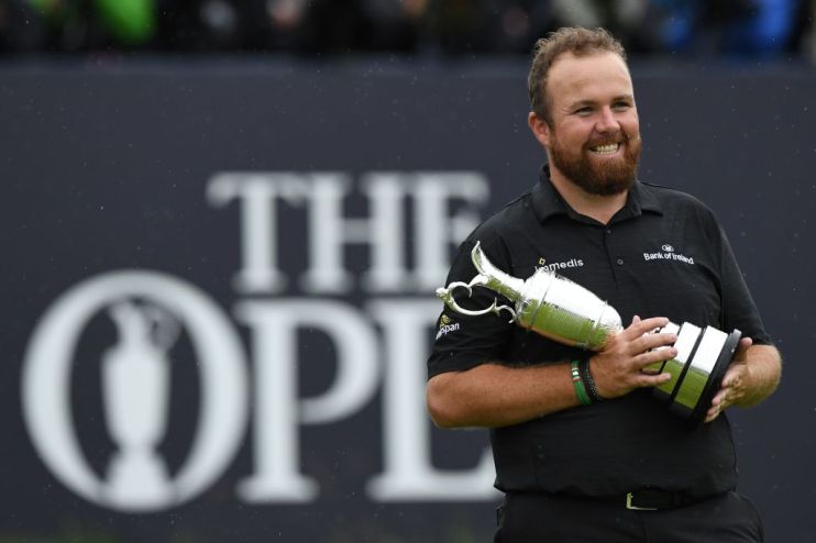 Ireland's Shane Lowry poses with the Claret Jug, the trophy for the Champion golfer of the year after winning the British Open golf Championships at Royal Portrush golf club in Northern Ireland on July 21, 2019. (Photo by Glyn KIRK / AFP) / RESTRICTED TO EDITORIAL USE (Photo credit should read GLYN KIRK/AFP/Getty Images)