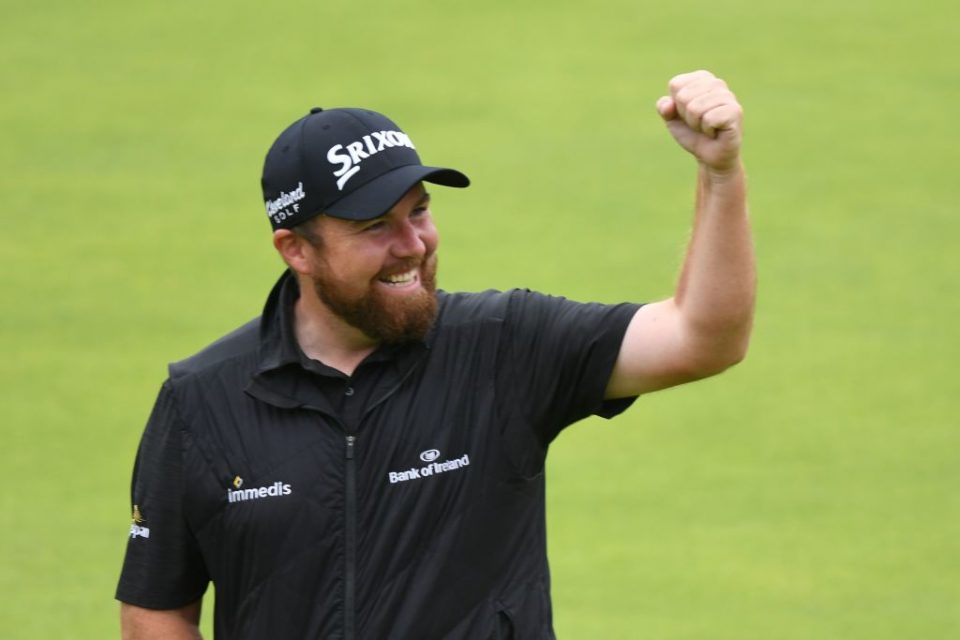 Ireland's Shane Lowry celebrates as he walks up the 18th fairway during the final round of the British Open golf Championships at Royal Portrush golf club in Northern Ireland on July 21, 2019. (Photo by Andy BUCHANAN / AFP) / RESTRICTED TO EDITORIAL USE (Photo credit should read ANDY BUCHANAN/AFP/Getty Images)