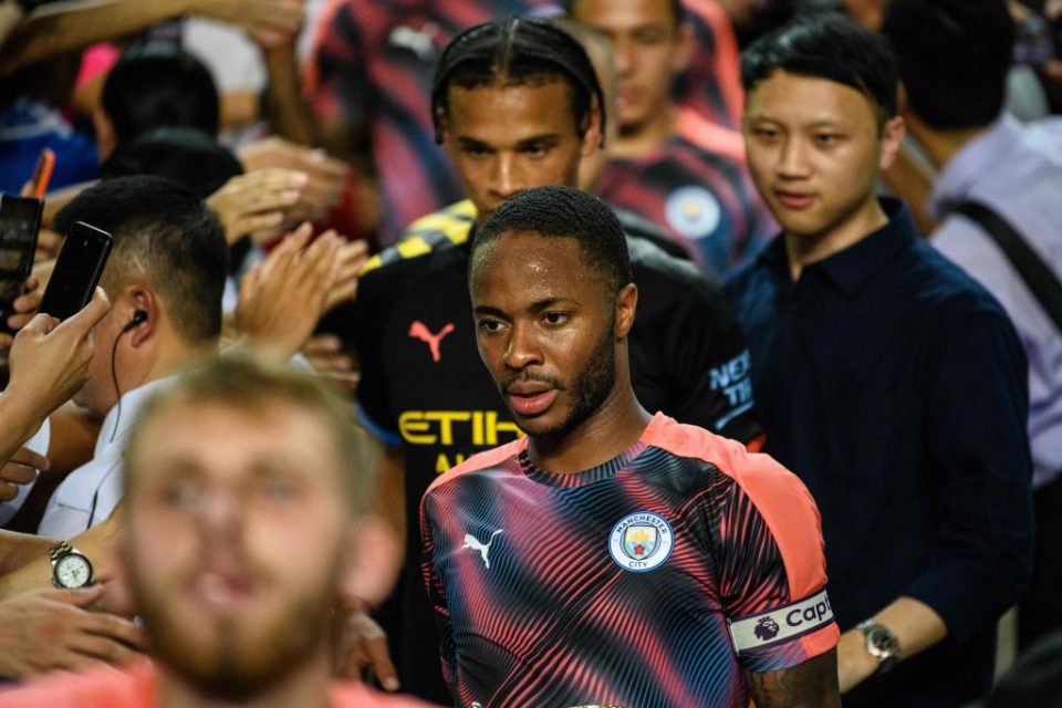 Manchester City's British forward Raheem Sterling (C) leaves the podium with his teammates at the end of the friendly football match between English Premier League club Manchester City and Hong Kong's Kitchee at the Hong Kong Stadium, in Hong Kong on July 24, 2019. (Photo by Anthony WALLACE / AFP) (Photo credit should read ANTHONY WALLACE/AFP/Getty Images)