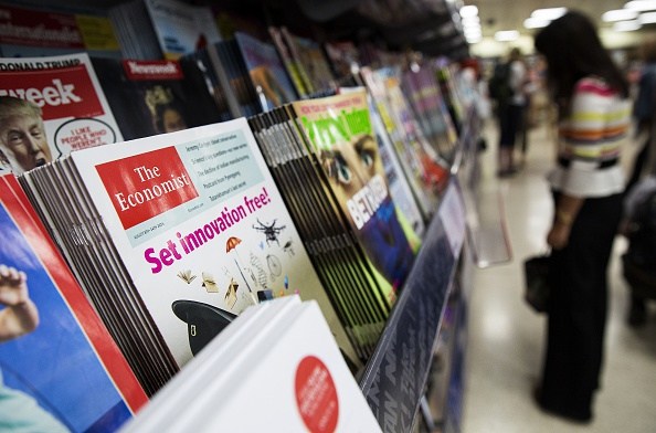A copy of the Economist magazine is pictured on a news stand in central London on August 12, 2015. British publishing company Pearson on Wednesday said it had agreed to sell its 50-percent stake in The Economist Group, owner of prestigious magazine The Economist. The share is being sold for &pound;469 million ($730 million, 663 million euros), split between The Economist Group itself and Italian investment firm Exor, which is controlled by the Agnelli family, Pearson said in a statement. AFP PHOTO / JACK TAYLOR (Photo credit should read JACK TAYLOR/AFP/Getty Images)