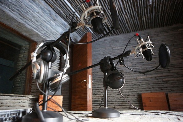 JOMSOM, NEPAL - MAY 28: Microphones and other equipment in the recording room of the MBC radio station on May 28, 2014 in Jomsom, Nepal. The Mustang Broadcasting Community building which is financed by the Korea International Cooperation Agency and designed by Archium utilising locally available materials and labour is the first radio station of its kind in Mustang. Mustang is one of Nepal's most remote regions and the station sits 3000 metres above sea level, situated on a ledge close to the banks of the Kali Gandaki River. (Photo by Taylor Weidman/Getty Images)