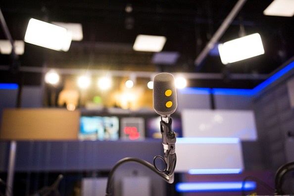 A microphone bearing the logo of the news public channel Franceinfo is pictured on September 20, 2016 at the French public service radio broadcaster Radio France's headquarters in Paris. / AFP / MARTIN BUREAU (Photo credit should read MARTIN BUREAU/AFP/Getty Images)