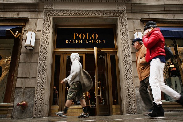 NEW YORK, NY - APRIL 04: People walk by Ralph Lauren's Fifth Avenue Polo store on April 4, 2017 in New York City. The luxury brand announced on Tuesday that it will close the exclusive location, just doors down from Trump Tower. The iconic clothing company has struggled financially as more shoppers migrate to online shopping among other consumer challenges. (Photo by Spencer Platt/Getty Images)
