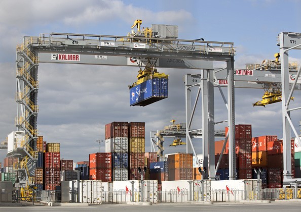 Shipping containers are pictured on the docks at DP World's London Gateway, container port at Corringham, east of London on April 10, 2017. / AFP PHOTO / Isabel Infantes (Photo credit should read ISABEL INFANTES/AFP/Getty Images)
