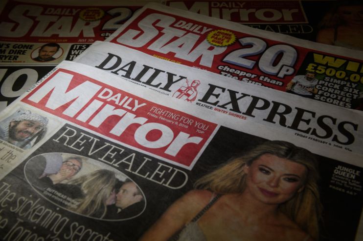 Express and Mirror publisher Reach will cut 550 jobs amid pandemic (Photo Illustration by Leon Neal/Getty Images)