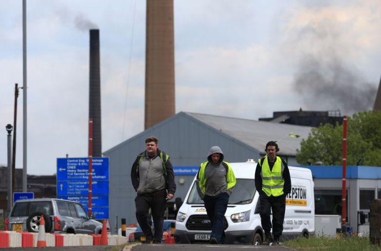 Britain's economy contracts in second quarter under Brexit pressure