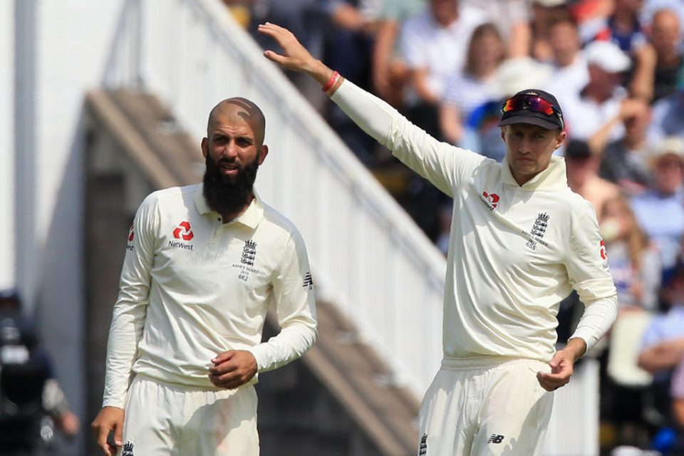England's Moeen Ali (L) and England's captain Joe Root gesture during play on the opening day of the first Ashes cricket Test match between England and Australia at Edgbaston in Birmingham, central England on August 1, 2019. (Photo by Lindsey Parnaby / AFP) / RESTRICTED TO EDITORIAL USE. NO ASSOCIATION WITH DIRECT COMPETITOR OF SPONSOR, PARTNER, OR SUPPLIER OF THE ECB (Photo credit should read LINDSEY PARNABY/AFP/Getty Images)