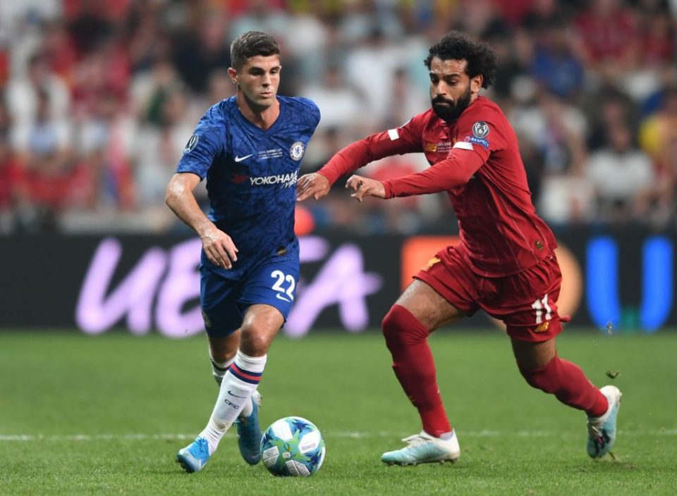 Chelsea's US midfielder Christian Pulisic (L) vies for the ball with Liverpool's Egyptian midfielder Mohamed Salah during the UEFA Super Cup 2019 football match between FC Liverpool and FC Chelsea at Besiktas Park Stadium in Istanbul on August 14, 2019. (Photo by OZAN KOSE / AFP) (Photo credit should read OZAN KOSE/AFP/Getty Images)