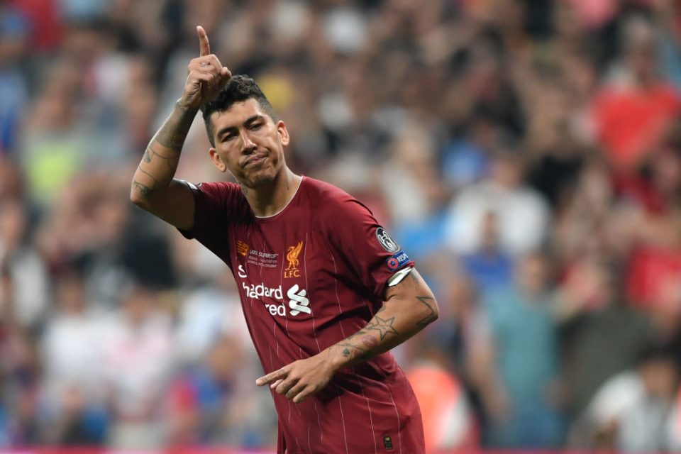 Liverpool's Brazilian midfielder Roberto Firmino scores during the penalty shoot-out at the UEFA Super Cup 2019 football match between FC Liverpool and FC Chelsea at Besiktas Park Stadium in Istanbul on August 14, 2019. (Photo by OZAN KOSE / AFP) (Photo credit should read OZAN KOSE/AFP/Getty Images)