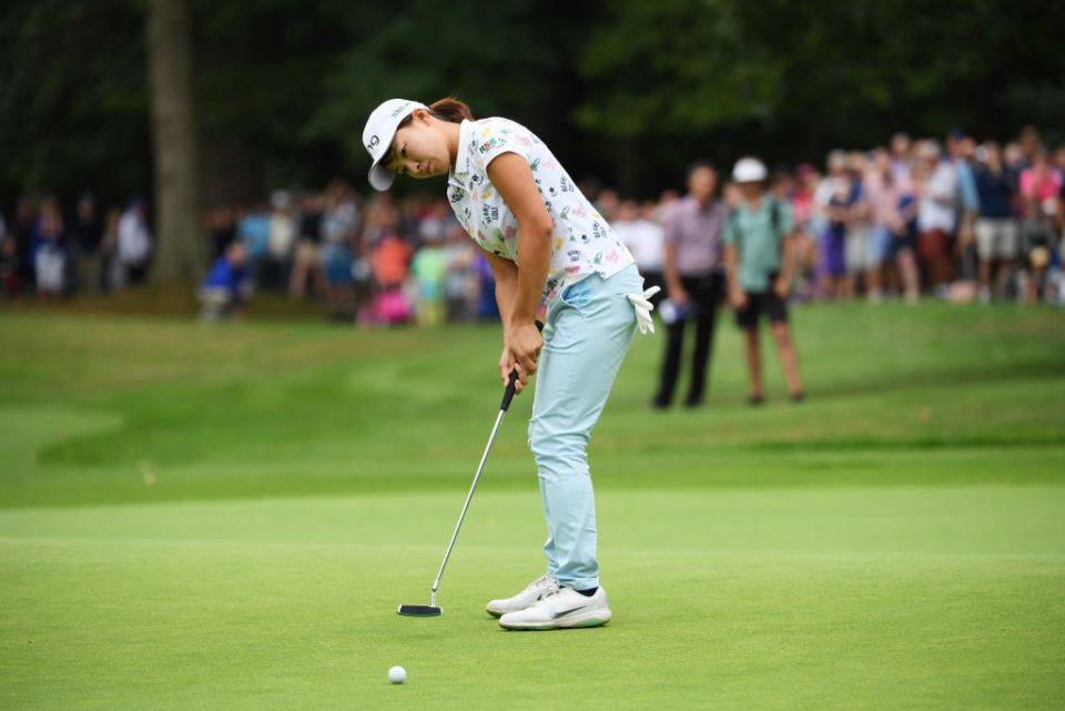 WOBURN, ENGLAND - AUGUST 04:  Hinako Shibuno of Japan holes the winning putt on the 18th green during Day Four of the AIG Women's British Open at Woburn Golf Club on August 04, 2019 in Woburn, England. (Photo by Ross Kinnaird/Getty Images)