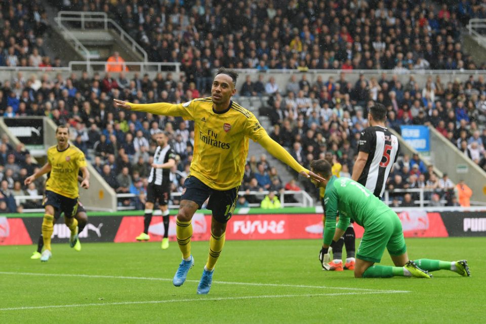 NEWCASTLE UPON TYNE, ENGLAND - AUGUST 11: Pierre-Emerick Aubameyang of Arsenal celebrates after scoring his team's first goal during the Premier League match between Newcastle United and Arsenal FC at St. James Park on August 11, 2019 in Newcastle upon Tyne, United Kingdom. (Photo by Stu Forster/Getty Images)