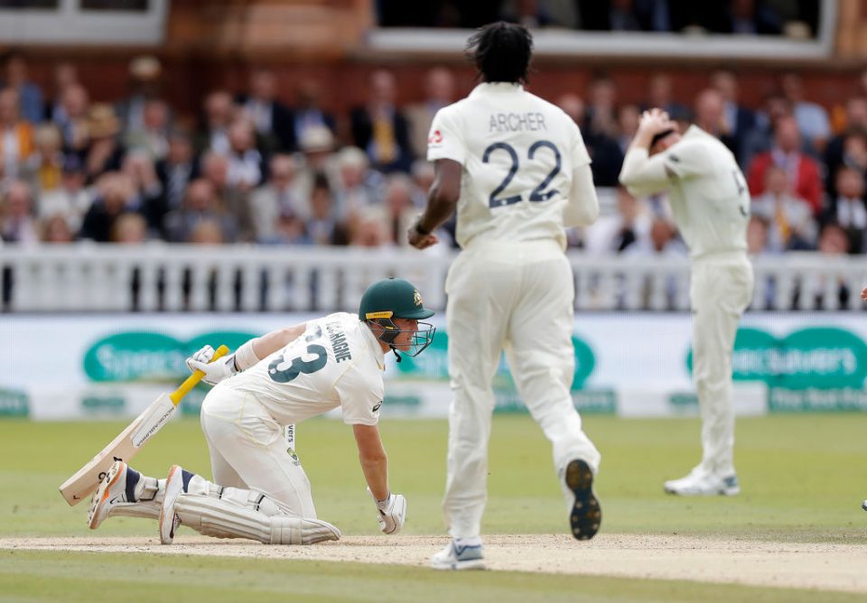 LONDON, ENGLAND - AUGUST 18: Marnus Labuschagne of Australia falls the the ground after being struck on the helmet by a delivery from Jofra Archer of England during day five of the 2nd Specsavers Ashes Test between England and Australia at Lord's Cricket Ground on August 18, 2019 in London, England. (Photo by Ryan Pierse/Getty Images)