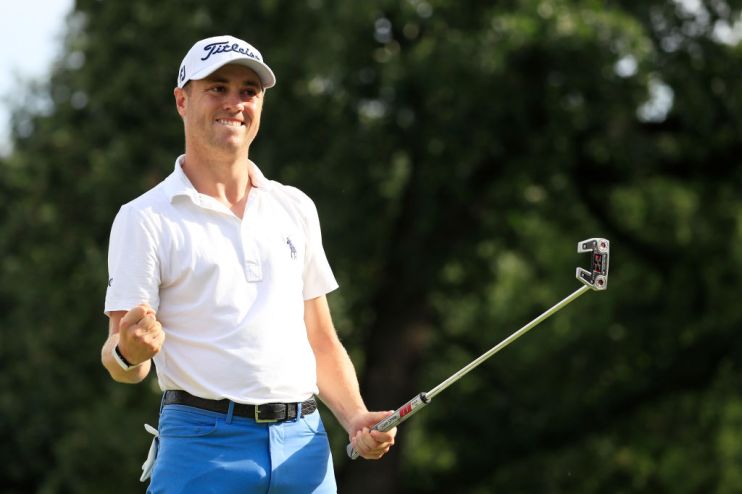 MEDINAH, ILLINOIS - AUGUST 18: Justin Thomas of the United States celebrates on the 18th green after winning during the final round of the BMW Championship at Medinah Country Club No. 3 on August 18, 2019 in Medinah, Illinois. (Photo by Cliff Hawkins/Getty Images)
