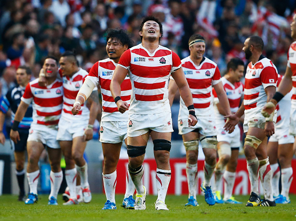 BRIGHTON, ENGLAND - SEPTEMBER 19: Japan players celebrate their surprise victory during the 2015 Rugby World Cup Pool B match between South Africa and Japan at the Brighton Community Stadium on September 19, 2015 in Brighton, United Kingdom. (Photo by Julian Finney/Getty Images)