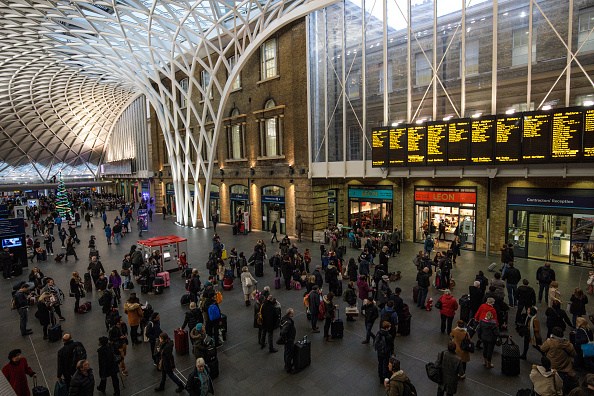 LONDON, ENGLAND - JANUARY 02: Commuters wait to board trains at King's Cross Station on January 2, 2018 in London, England. The average cost of a rail ticket has risen by 3.4% today, the biggest increase since 2013. (Photo by Jack Taylor/Getty Images)
