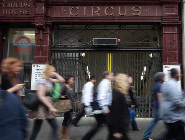LONDON, ENGLAND - SEPTEMBER 06: Commuters make their way past a closed Underground tube station at Oxford Circus on September 6, 2010 in London, England. A 24 hour strike by Tube staff belonging to the RMT and TSSA unions in protest over plans to axe 800 station managerial jobs and ticket office staff is due to commence this evening disrupting rush hour commuters across the capital. (Photo by Dan Kitwood/Getty Images)