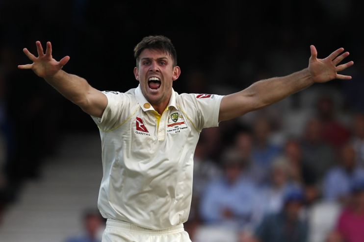 Australia's Mitchell Marsh celebrates taking the wicket of England's Chris Woakes for two during play on the first day of the fifth Ashes cricket Test match between England and Australia at The Oval in London on September 12, 2019. (Photo by Adrian DENNIS / AFP) / RESTRICTED TO EDITORIAL USE. NO ASSOCIATION WITH DIRECT COMPETITOR OF SPONSOR, PARTNER, OR SUPPLIER OF THE ECB (Photo credit should read ADRIAN DENNIS/AFP/Getty Images)