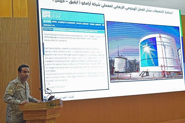 Oil prices fall back after yesterday's record rise as Saudi military Colonel Turki al-Maliki speaks at a conference about the attacks