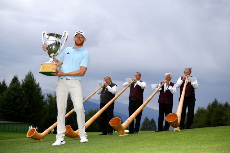 CRANS-MONTANA, SWITZERLAND - SEPTEMBER 01: Sebastian Soderberg of Sweden poses with the trophy following his victory in the play off during Day Four of the Omega European Masters at Crans Montana Golf Club on September 01, 2019 in Crans-Montana, Switzerland. (Photo by Stuart Franklin/Getty Images)