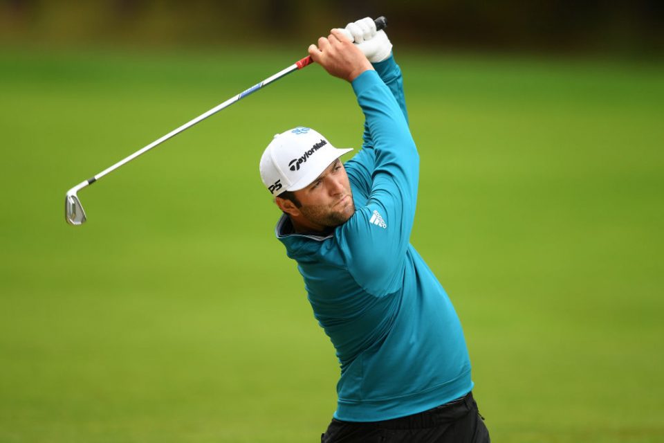 VIRGINIA WATER, ENGLAND - SEPTEMBER 22: Jon Rahm of Spain plays his second shot on the 12th hole during Day 4 of the BMW PGA Championship at Wentworth Golf Club on September 22, 2019 in Virginia Water, United Kingdom. (Photo by Harry Trump/Getty Images)