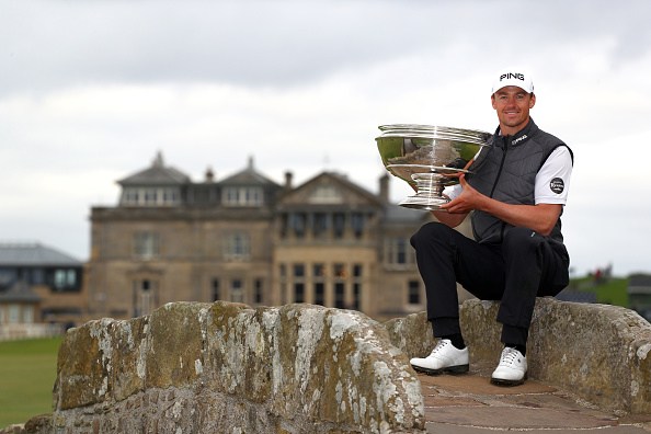 ST ANDREWS, SCOTLAND - SEPTEMBER 29: Winner, Victor Perez of France poses with the trophy on the Swilken Bridge on the 18th hole during Day four of the Alfred Dunhill Links Championship at The Old Course on September 29, 2019 in St Andrews, United Kingdom. (Photo by Matthew Lewis/Getty Images)