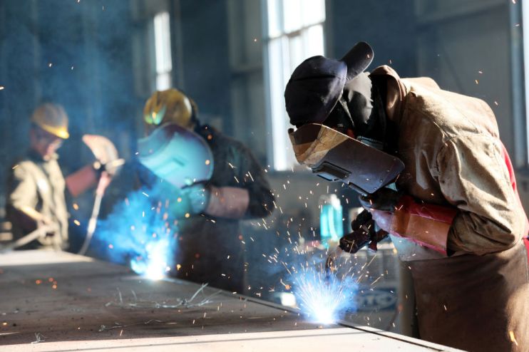 US manufacturing sector shrinks for first time in three years, survey shows