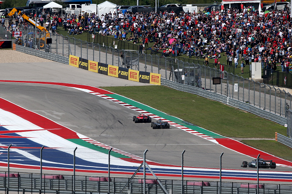 AUSTIN, TX - OCTOBER 21: Kimi Raikkonen of Finland driving the (7) Scuderia Ferrari SF71H leads Lewis Hamilton of Great Britain driving the (44) Mercedes AMG Petronas F1 Team Mercedes WO9 on track during the United States Formula One Grand Prix at Circuit of The Americas on October 21, 2018 in Austin, United States. (Photo by Charles Coates/Getty Images)