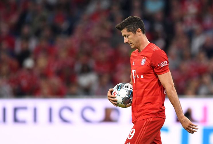 Bayern Munich's Polish forward Robert Lewandowski walks up to the penalty spot during the German First division Bundesliga football match FC Bayern Munich v Hertha Berlin in Munich, southern Germany, on August 16, 2019. (Photo by Christof STACHE / AFP) / DFL REGULATIONS PROHIBIT ANY USE OF PHOTOGRAPHS AS IMAGE SEQUENCES AND/OR QUASI-VIDEO (Photo credit should read CHRISTOF STACHE/AFP/Getty Images)