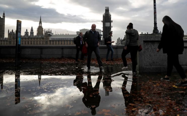 Parliament in the rain as Met Office issues UK flood alerts before Hurricane Lorenzo arrives
