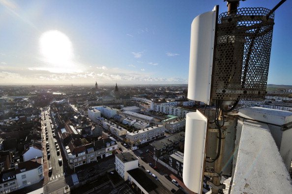 A picture taken on January 2, 2012 in the northern French city of Calais shows a mobile phone mast located on top of a building. AFP PHOTO / PHILIPPE HUGUEN (Photo credit should read PHILIPPE HUGUEN/AFP/GettyImages)