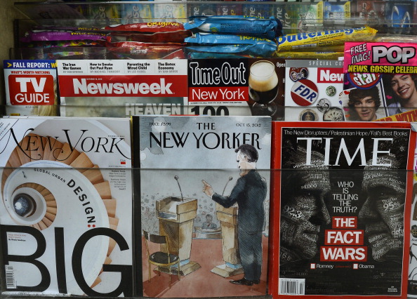 The New Yorker magazine's October 15 edition is diplayed in an Upper East Side newstand in New York on October 9, 2012. The New Yorker has created a cover illustration, titled &ldquo;One on One,&rdquo; by Barry Blitt of the first presidential debate between President Barack Obama and GOP opponent Mitt Romney that seems to be a parody of Clint Eastwood&lsquo;s speech involving an empty chair at the Republican National Convention. AFP PHOTO / TIMOTHY A. CLARY (Photo credit should read TIMOTHY A. CLARY/AFP/Getty Images)