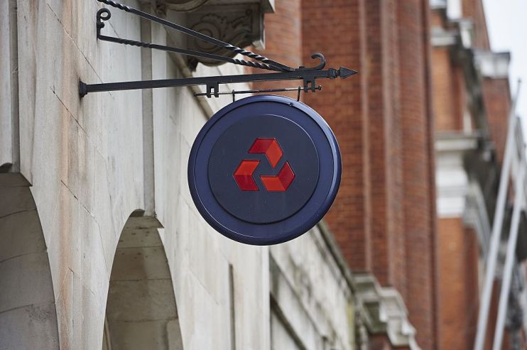 Natwest down: Natwest logo hangs on shingle outside a branch of the bank