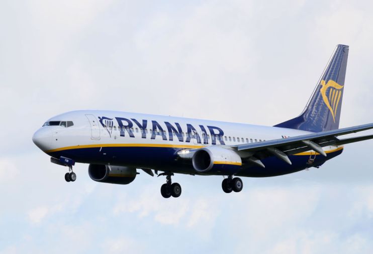 Ryanair boosts profit guidance but warns of wider losses at Laudamotion