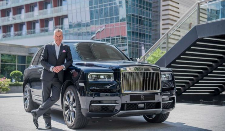 Rolls Royce CEO Torsten Muller-Otvos with Cullinan by Rolls-Royce