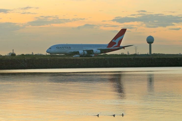 Australian airline Qantas has suspended plans to commence record-breaking non-stop flights to London and New York due to disruption caused by coronavirus.